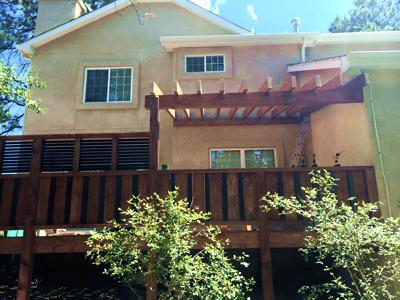 Custom Rail & Privacy Features from Woodland Park Deck Builder