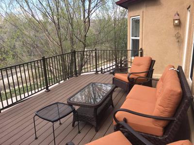 Composite Deck & Stone Patio  from Woodland Park Deck Builder