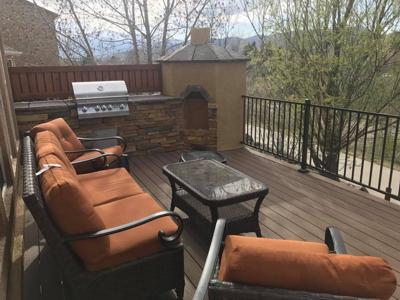 Composite Deck & Stone Patio  from Woodland Park Deck Builder