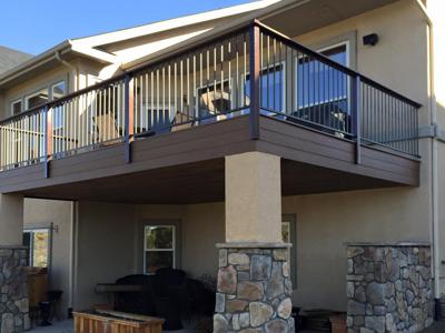 Composite Deck & Stone Patio  from Woodland Park Deck Builder
